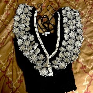 Women’s black and white flowered shirt